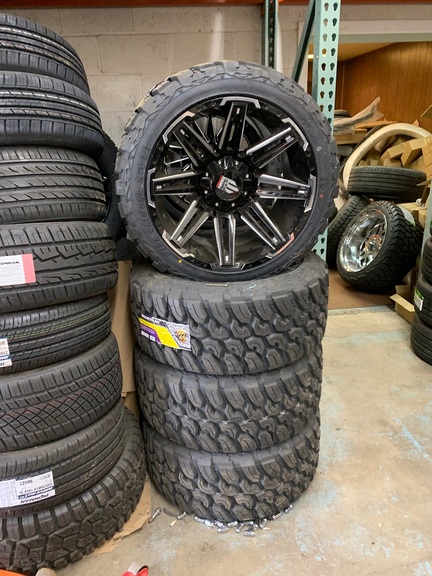 American Truxxx Black 22x12 Ford F250/350 -44mm Offset with 33/1250/22 MT Tires