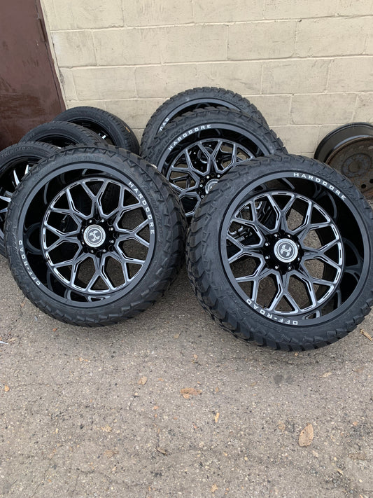 Hardcore Off-road 22x12 -44mm Offset Black Chevy/Dodge 2500/3500 8x6.5 with AMP 305/40/22 All Terrain Tires