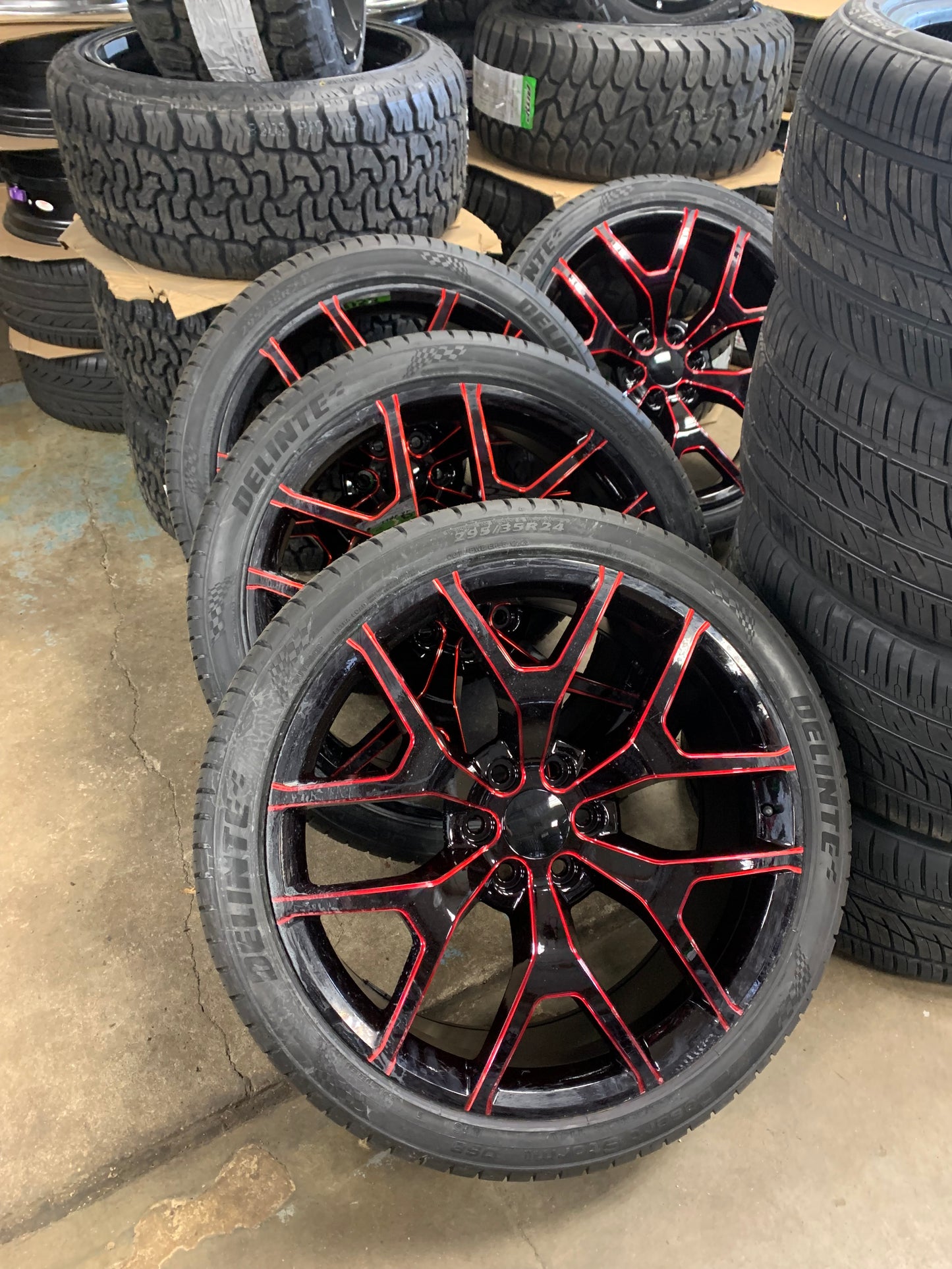 24" Black and Red Snowflake for Chevy 6 Lug with 295/35/24 Delinte Tires