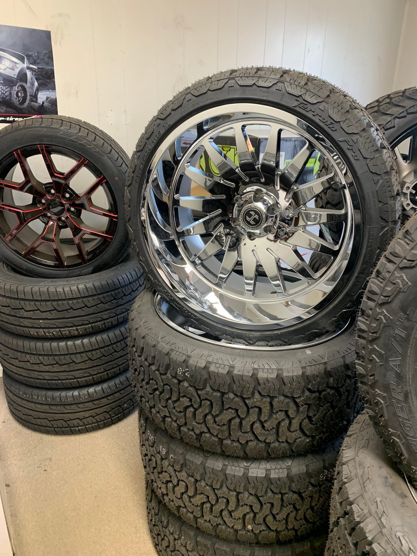 Hardcore 8x180 Chrome with 305/40/22 AMP All Terrain Tires